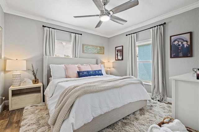 2419 29th Ave E, Palmetto, FL 34221 - bedroom featuring crown molding, wood finished floors, and a ceiling fan