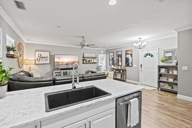 2419 29th Ave E, Palmetto, FL 34221 - kitchen featuring open floor plan, dishwasher, ornamental molding, light wood finished floors, and a chandelier