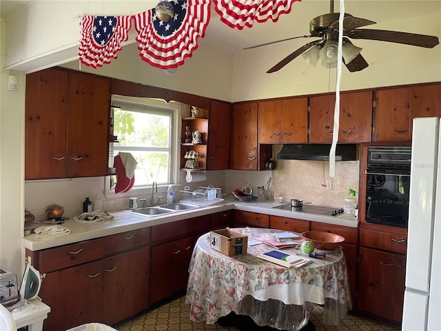 kitchen with backsplash, ceiling fan, black appliances, and sink