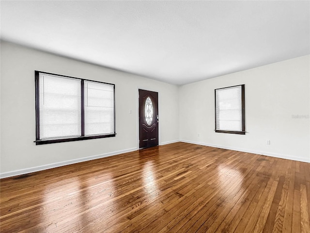 foyer featuring hardwood / wood-style flooring and a wealth of natural light