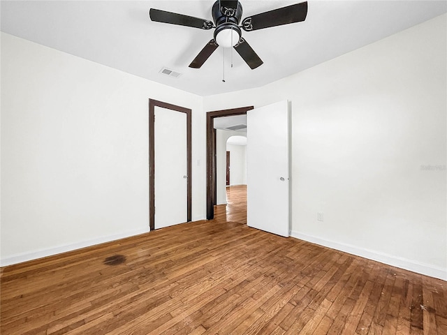 unfurnished bedroom featuring ceiling fan and light hardwood / wood-style floors