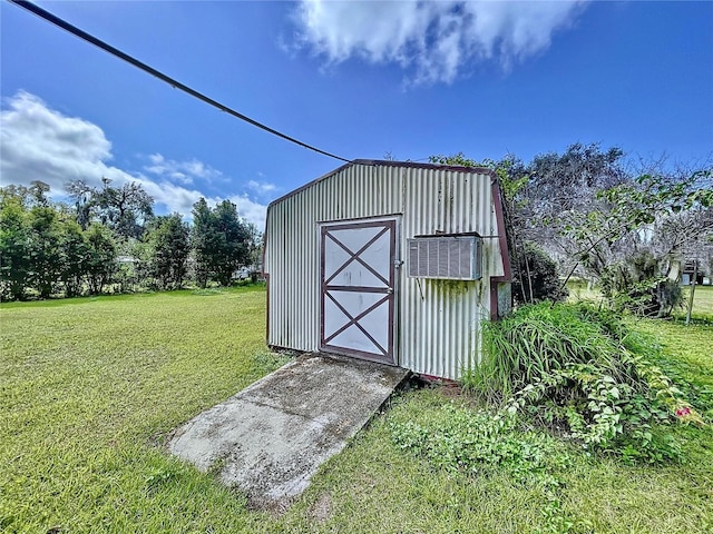 view of outdoor structure featuring a yard