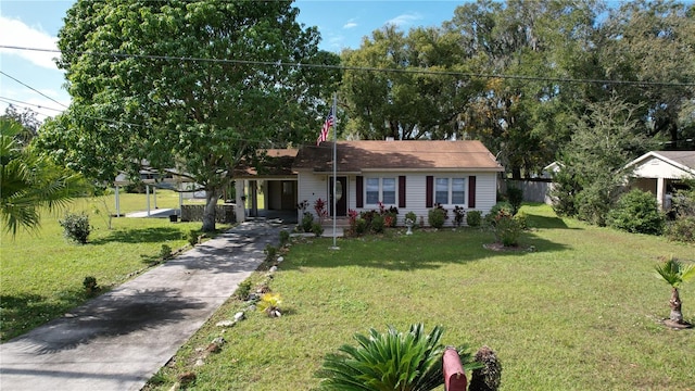 single story home with a front yard