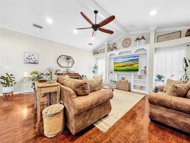 living room featuring wood-type flooring, ceiling fan, crown molding, and lofted ceiling with beams