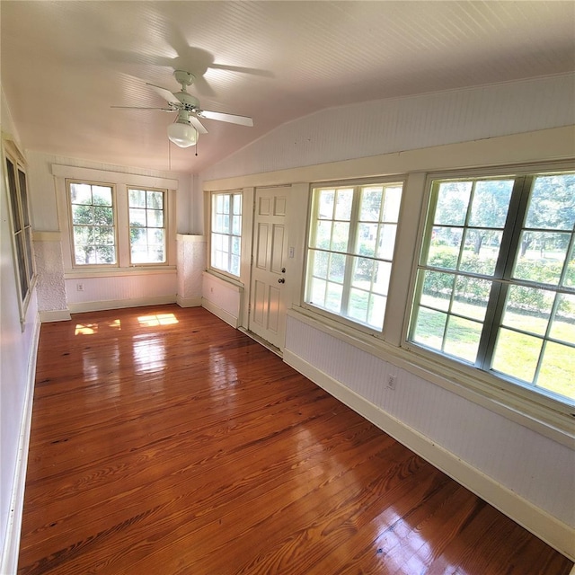 unfurnished sunroom featuring a ceiling fan and lofted ceiling