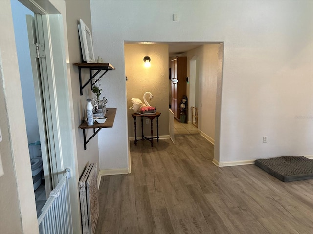 hall featuring hardwood / wood-style flooring