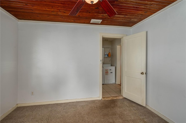 unfurnished room featuring carpet flooring and wood ceiling