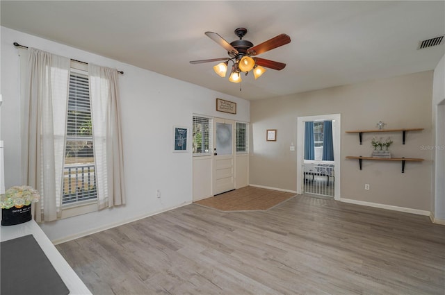 entryway featuring light hardwood / wood-style floors and ceiling fan