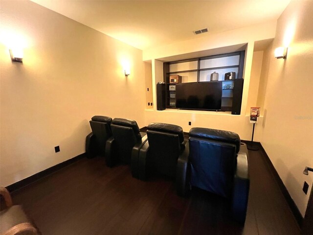 cinema room featuring wood-type flooring