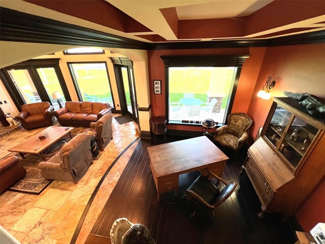 home theater room with hardwood / wood-style floors and french doors