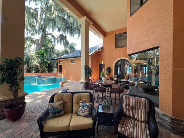 view of swimming pool featuring a patio