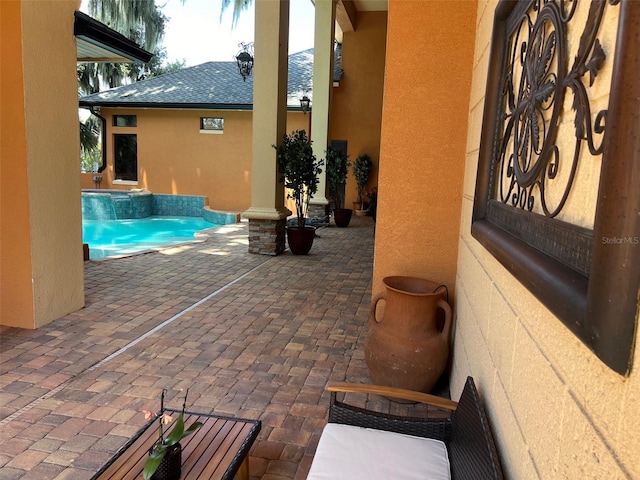 outdoor pool featuring a patio area