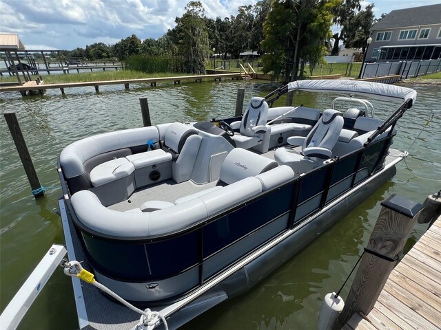 dock area featuring outdoor lounge area and a water view