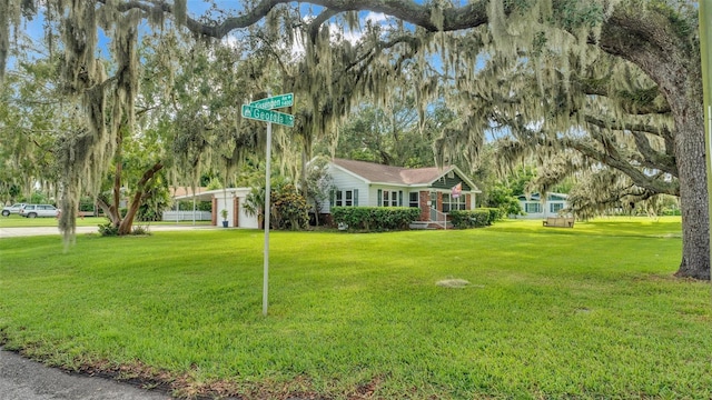 exterior space featuring a front lawn