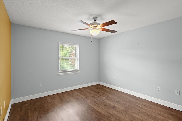 unfurnished room featuring hardwood / wood-style flooring and ceiling fan