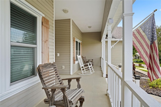 balcony featuring covered porch