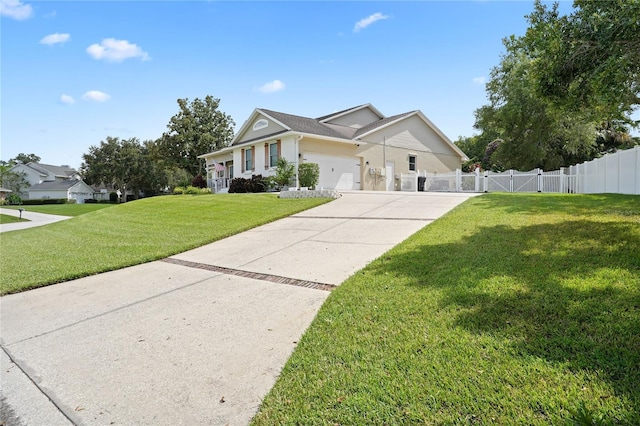 view of front of home featuring a front yard and a garage