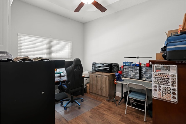 home office with hardwood / wood-style flooring and ceiling fan