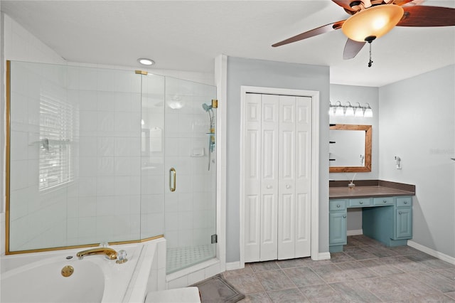 bathroom featuring ceiling fan, separate shower and tub, and vanity