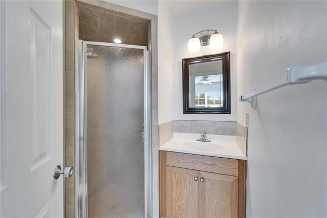 bathroom featuring vanity and walk in shower