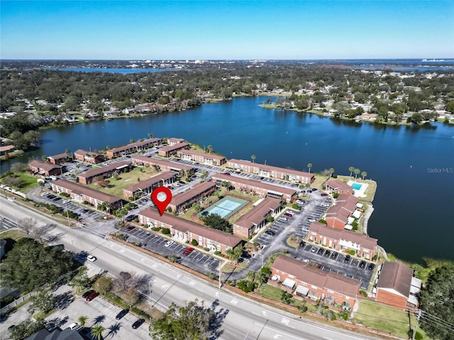 bird's eye view with a water view