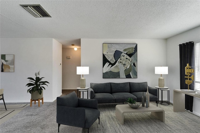 carpeted living room featuring a textured ceiling and a wealth of natural light