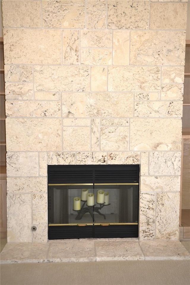 interior details featuring a fireplace