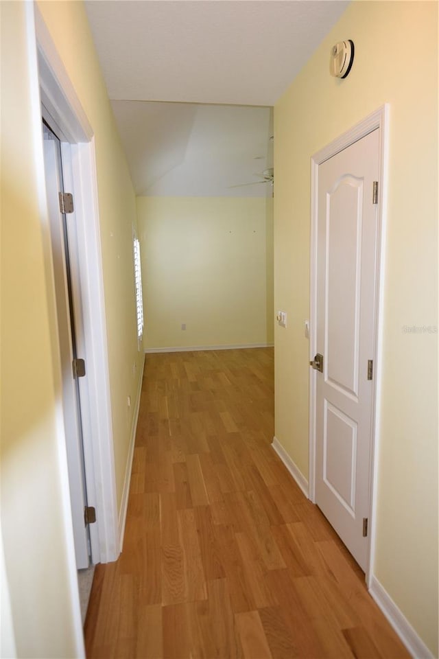 corridor featuring light wood-type flooring