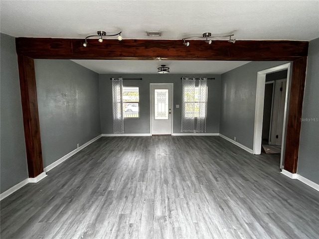 unfurnished room featuring wood-type flooring