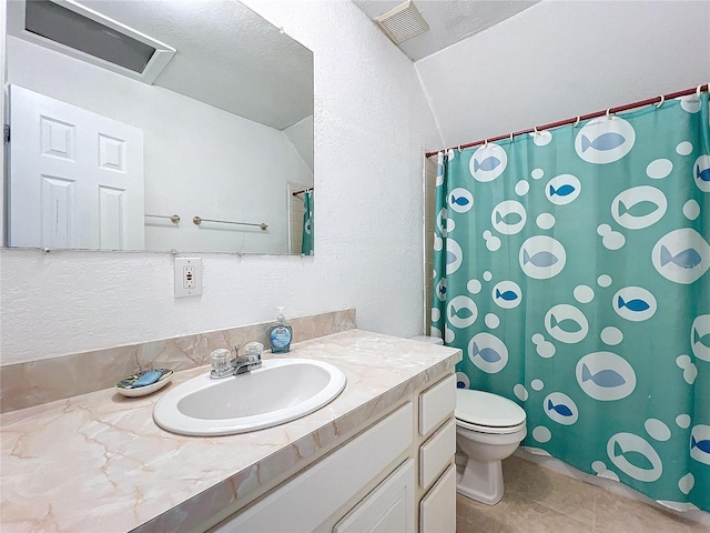 bathroom featuring toilet, curtained shower, vanity, and tile patterned floors