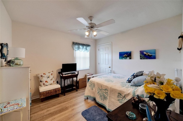 bedroom featuring ceiling fan and light wood-type flooring