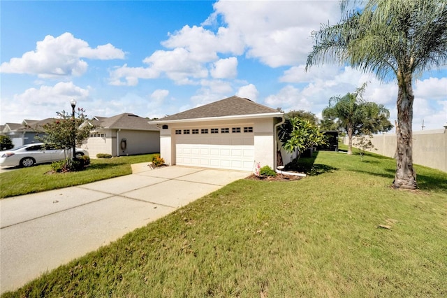 ranch-style home with a garage and a front lawn