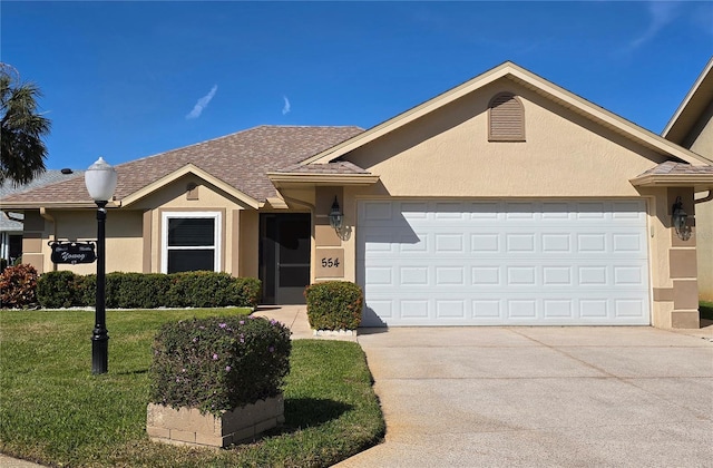 single story home featuring a front yard and a garage