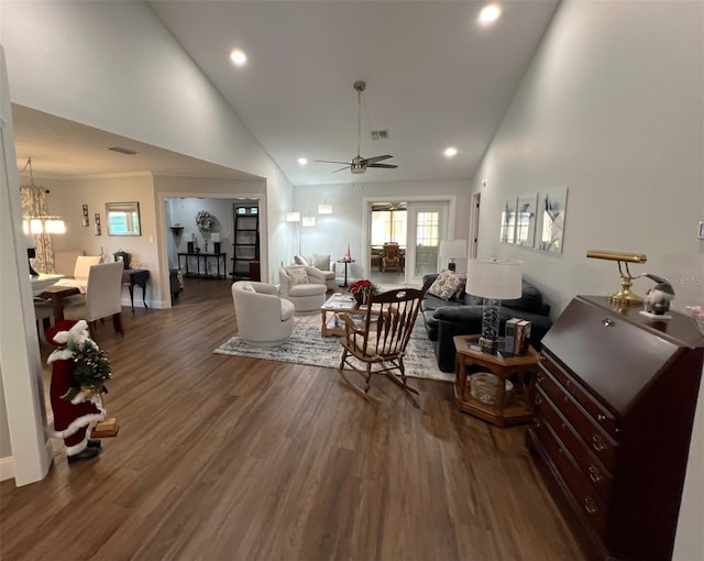 living room featuring dark hardwood / wood-style floors, ceiling fan, and high vaulted ceiling