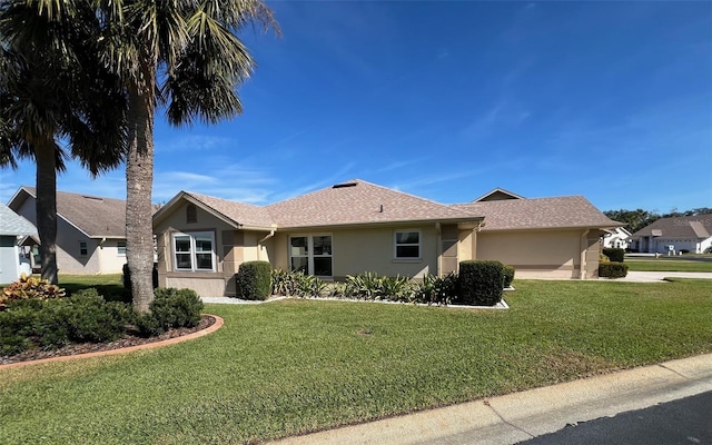 single story home with a front yard