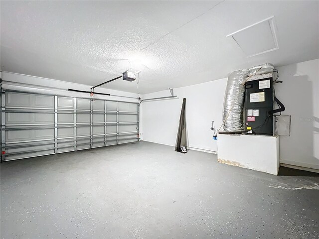 garage with heating unit and a garage door opener