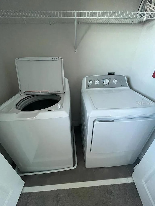 laundry area with washer and clothes dryer