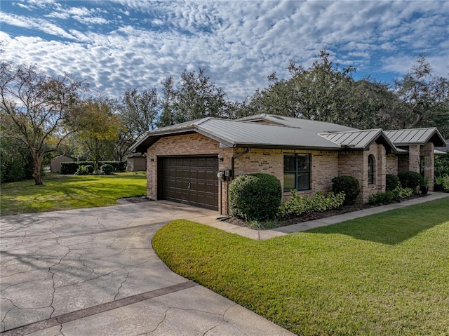 ranch-style house with a front lawn and a garage