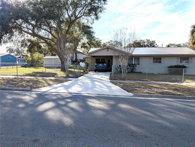 single story home featuring a carport