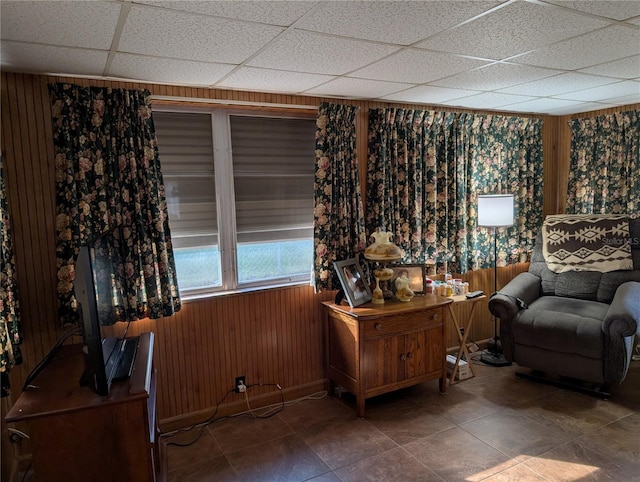 office space featuring wood walls