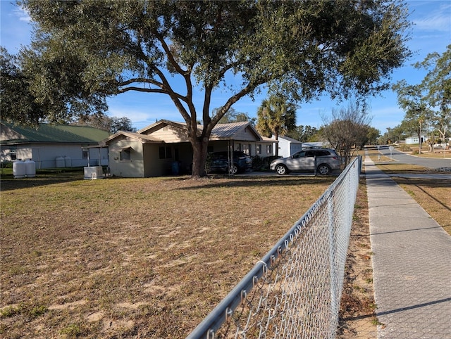 exterior space featuring a front lawn