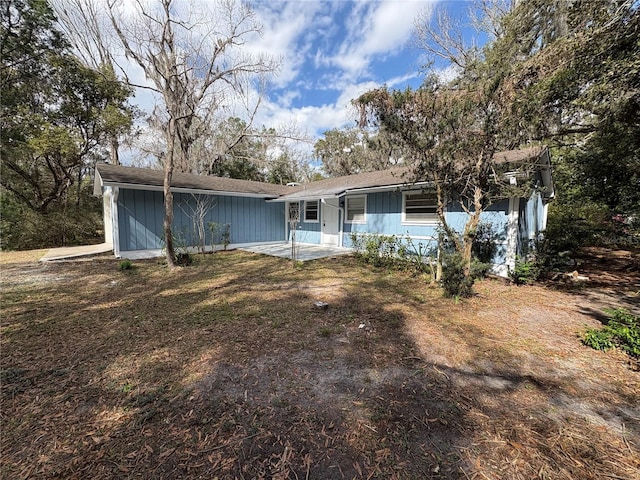 single story home with a patio