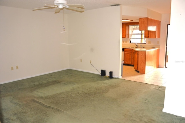 17 Kendra Ct, Winter Haven, FL 33880 - interior space with sink, light carpet, and ceiling fan