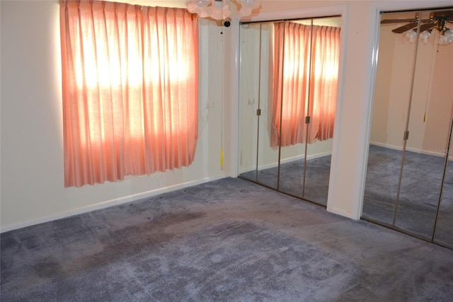 17 Kendra Ct, Winter Haven, FL 33880 - unfurnished bedroom featuring multiple closets and carpet