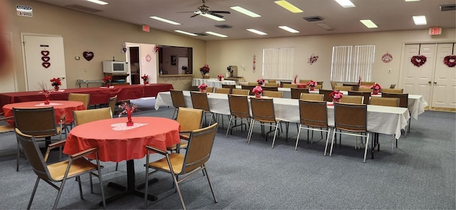 17 Kendra Ct, Winter Haven, FL 33880 - dining space with ceiling fan and dark colored carpet