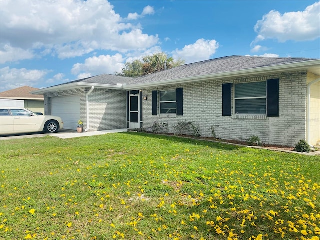 single story home with a garage and a front lawn