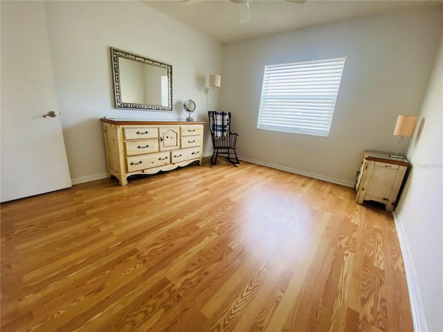 unfurnished bedroom featuring ceiling fan and light hardwood / wood-style flooring