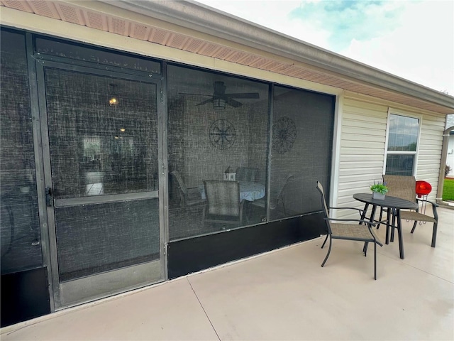 view of patio / terrace with a sunroom