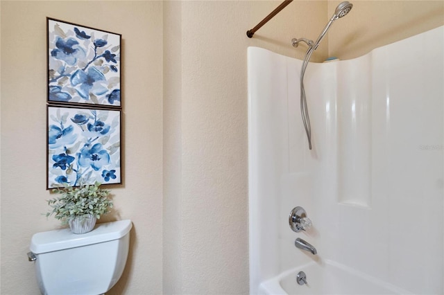 full bathroom featuring  shower combination and toilet