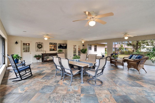 dining area with stone finish floor